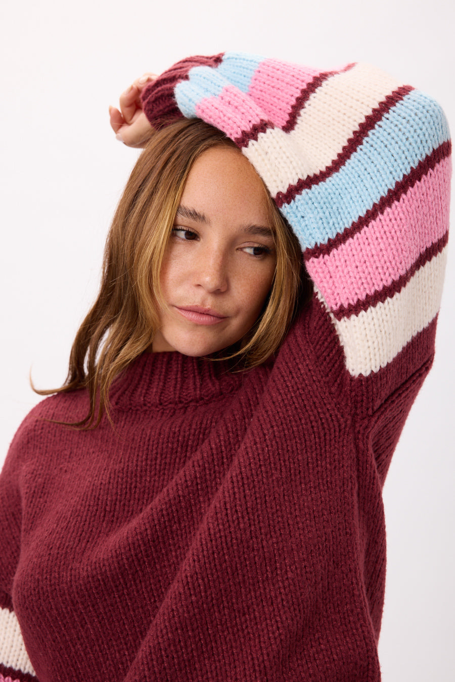 SWEATER PELUCHE MANGAS RAYADAS 25R8245